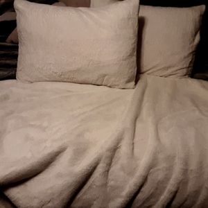 Faux rabbit fur shams and blanket